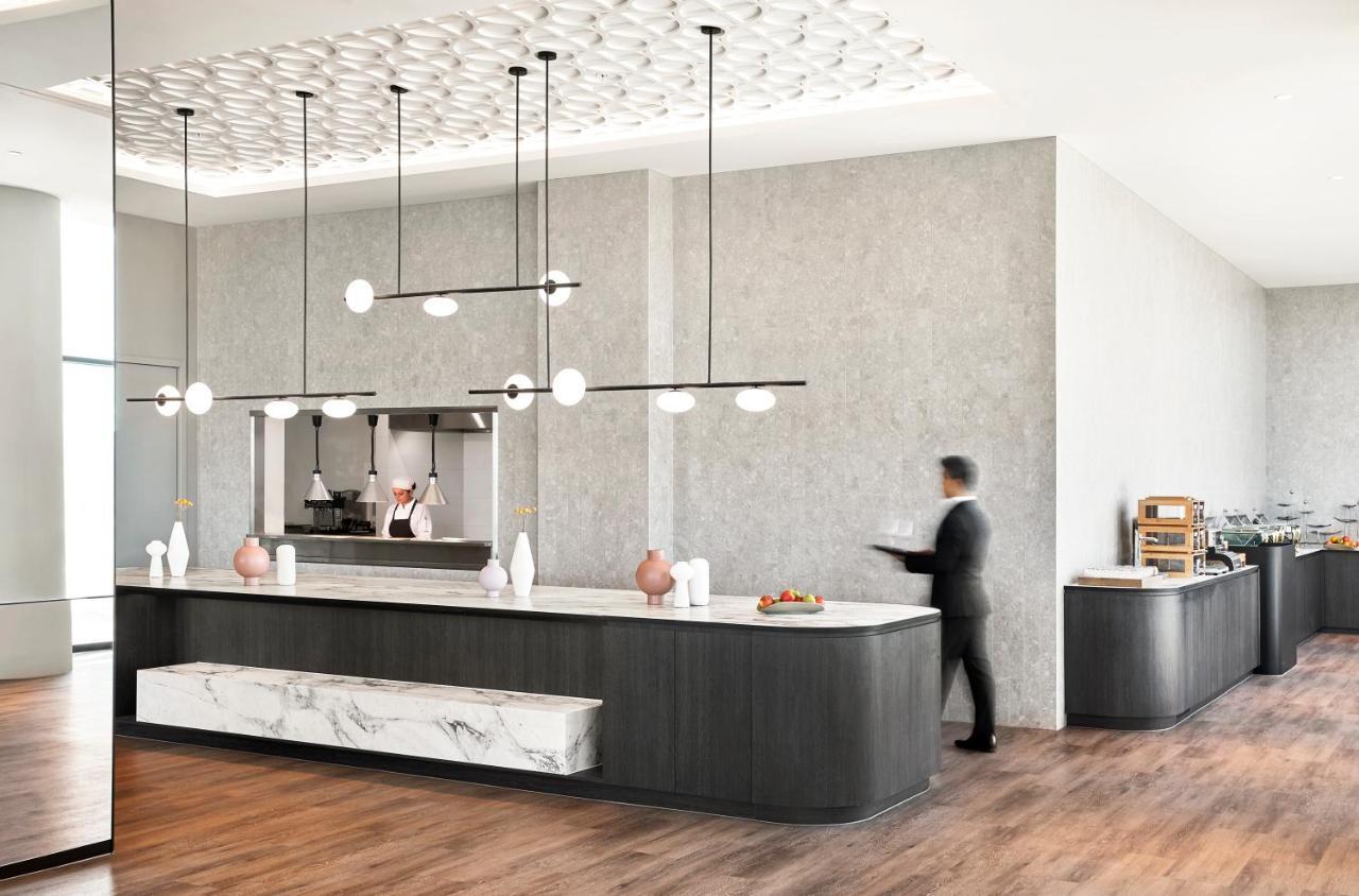 Oakwood Premier Melbourne Aparthotel Bagian luar foto The kitchen at the restaurant