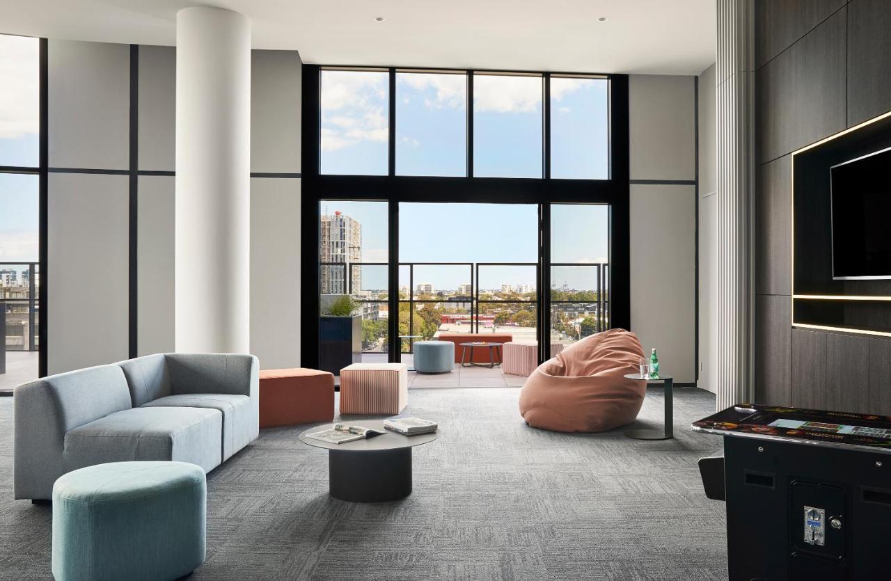 Oakwood Premier Melbourne Aparthotel Bagian luar foto The common room at the new residence hall